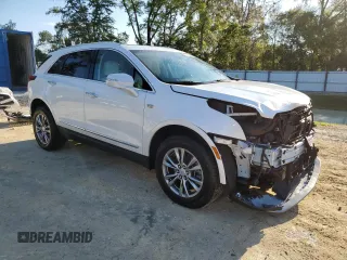 2023 Cadillac XT5 FWD Premium Luxury with VIN 1GYKNCR44PZ159038, listed as a Copart auction lot 50614465 with 11,781 mi miles and Salvage Title. Bid and sale history available at carsss.com. Image 4.