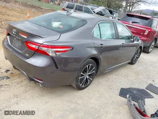 2019 Toyota Camry LE with VIN 4T1B11HK0KU263338, listed as a IAAI auction lot 41826497 with 63,676 mi miles. Bid and sale history available at carsss.com. Image 4.
