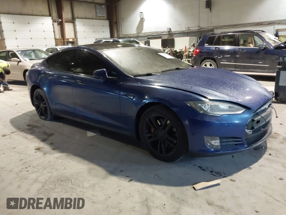 2014 Tesla Model S 60 with VIN 5YJSA1H1XEFP30497, listed as a IAAI auction lot 41294630 with 203,663 mi miles and . Bid and sale history available at DreamBid. Image 1.