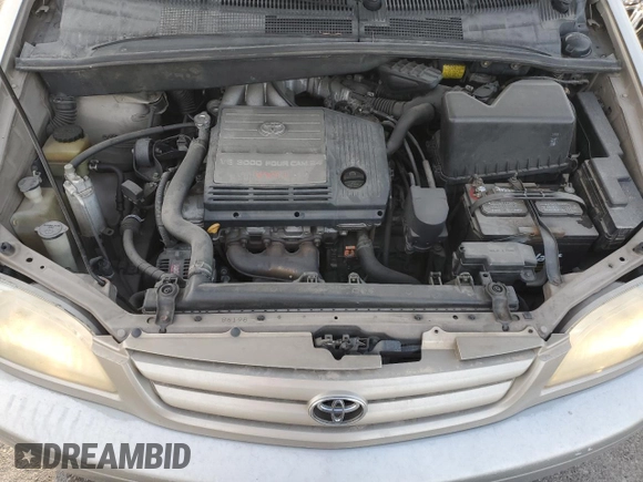 2002 Toyota Sienna LE with VIN 4T3ZF13C12U486009, listed as a Copart auction lot 87877695 with 250,778 mi miles and Salvage Title. Bid and sale history available at carsss.com. Image 12.
