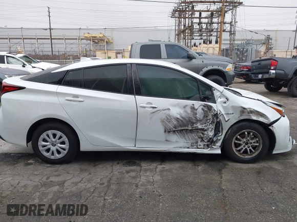 2021 Toyota Prius L Eco with VIN JTDKAMFU6M3150707, listed as a IAAI auction lot 41867272 with 55,499 mi miles and . Bid and sale history available at DreamBid. Image 14.