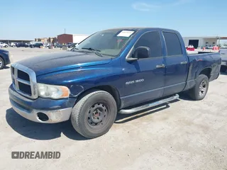 2004 Dodge 1500 SLT with VIN 1D7HA18N04J144868, listed as a IAAI auction lot 41870559 with 157,379 mi miles. Bid and sale history available at carsss.com. Image 2.