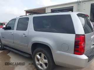 2013 Chevrolet Suburban LT with VIN 1GNSCJE03DR164477, listed as a IAAI auction lot 42083985 with 150,540 mi miles and . Bid and sale history available at DreamBid. Image 14.