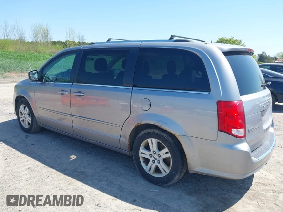 2013 Dodge Grand Caravan Crew with VIN 2C4RDGDG1DR800538, listed as a IAAI auction lot 42211140 with 138,647 mi miles and . Bid and sale history available at DreamBid. Image 3.