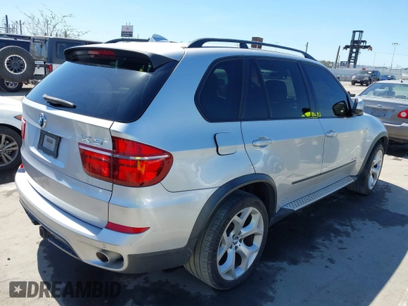 2012 BMW X5 35d z VIN 5UXZW0C5XCL665504, wystawiony jako IAAI lot #41835285 z przebiegiem 134 245 mil mil oraz . Historia ofert i sprzedaży dostępna na DreamBid. Obrazek 4.