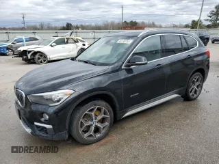 2018 BMW X1 xDrive28i with VIN WBXHT3C36J5F90927, listed as a Copart auction lot 45130255 with 119,192 mi miles and Salvage Title. Bid and sale history available at carsss.com. Image 1.
