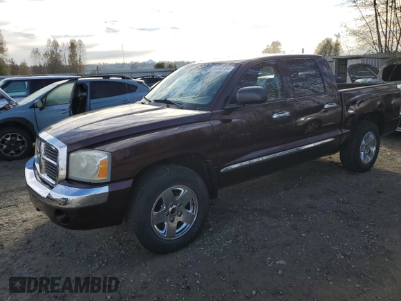 2005 Dodge Dakota Laramie with VIN 1D7HW58NX5S248188, listed as a Copart auction lot 75443734 with 209,716 mi miles and Salvage Title. Bid and sale history available at DreamBid. Image 1.