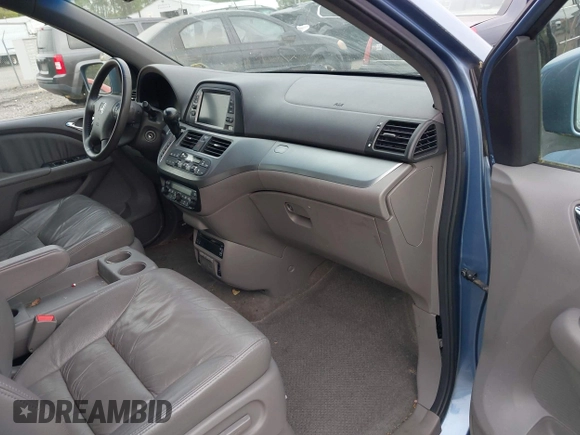2009 Honda Odyssey EX-L with VIN 5FNRL38709B016019, listed as a IAAI auction lot 42087099 with 227,141 mi miles. Bid and sale history available at carsss.com. Image 5.