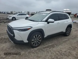2022 Toyota Corolla Cross XLE z VIN 7MUDAAAG7NV021020, wystawiony jako Copart lot #51115795 z przebiegiem 9 974 mil mil oraz Szkoda całkowita • Salvage title. Historia ofert i sprzedaży dostępna na DreamBid. Obrazek 1.