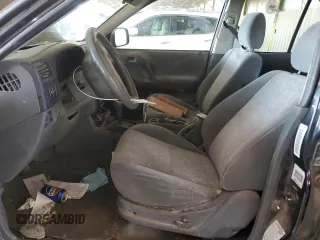 2001 Isuzu Rodeo S with VIN 4S2CK58W614344850, listed as a Copart auction lot 63807664 with 176,203 mi miles and Salvage title. Bid and sale history available at DreamBid. Image 7.