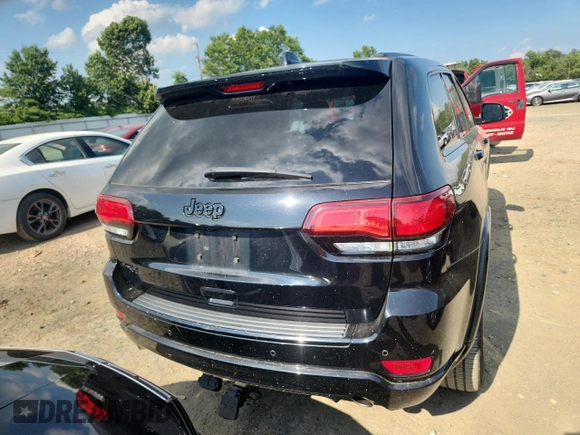 2018 Jeep Grand Cherokee Laredo E z VIN 1C4RJFAGXJC287415, wystawiony jako Copart lot #64182975 z przebiegiem 103 817 mil mil oraz Szkoda całkowita • Salvage title. Historia ofert i sprzedaży dostępna na DreamBid. Obrazek 6.