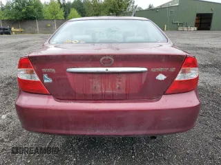 2004 Toyota Camry LE z VIN JTDBE32KX40273821, wystawiony jako Copart lot #58938275 z przebiegiem 153 096 mil mil oraz Szkoda całkowita • Salvage title. Historia ofert i sprzedaży dostępna na DreamBid. Obrazek 6.