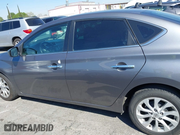 2019 Nissan Sentra SV z VIN 3N1AB7AP5KL621083, wystawiony jako IAAI lot #41838523 z przebiegiem 121 207 mil mil oraz . Historia ofert i sprzedaży dostępna na DreamBid. Obrazek 14.