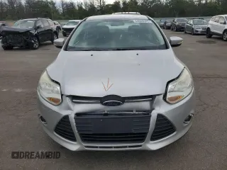 2012 Ford Focus SE with VIN 1FAHP3F2XCL202510, listed as a Copart auction lot 64066545 with 77,828 mi miles and Salvage title. Bid and sale history available at DreamBid. Image 5.