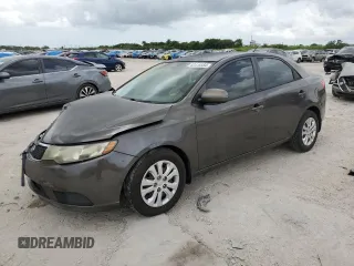 2011 Kia Forte EX with VIN KNAFU4A29B5460251, listed as a Copart auction lot 62419584 with 176,385 mi miles and Salvage Title. Bid and sale history available at carsss.com. Image 1.