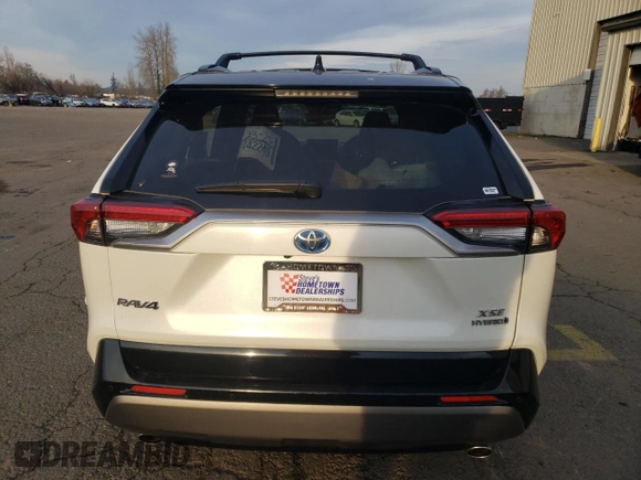2020 Toyota RAV4 Hybrid XSE with VIN JTMEWRFV5LD541943, listed as a Copart auction lot 84005364 with 88,435 mi miles and Salvage title. Bid and sale history available at DreamBid. Image 6.