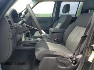 2010 Jeep Liberty Sport with VIN 1J4PN2GK3AW143682, listed as a Copart auction lot 54299555 with 137,257 mi miles and Salvage Title. Bid and sale history available at DreamBid. Image 7.