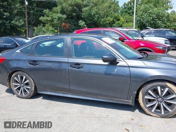 2023 Honda Civic EX with VIN 2HGFE1F75PH302414, listed as a IAAI auction lot 42680807 with 49,520 mi miles and . Bid and sale history available at DreamBid. Image 13.