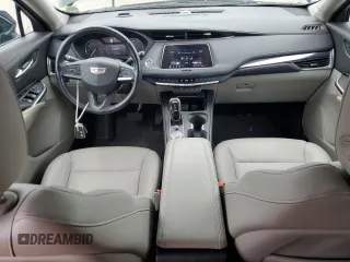 2021 Cadillac XT4 AWD Luxury with VIN 1GYFZBR4XMF014647, listed as a Copart auction lot 63800444 with 49,724 mi miles and Salvage Title. Bid and sale history available at carsss.com. Image 8.