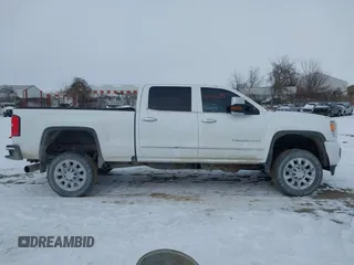 2015 GMC Sierra 2500HD available WiFi Denali with VIN 1GT120E88FF680538, listed as a IAAI auction lot 41571684 with 125,147 mi miles. Bid and sale history available at carsss.com. Image 13.