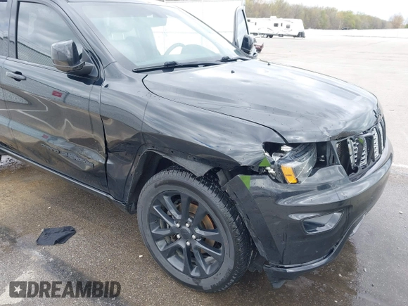 2018 Jeep Grand Cherokee Laredo with VIN 1C4RJFAG7JC468391, listed as a IAAI auction lot 42010443 with 91,585 mi miles and . Bid and sale history available at DreamBid. Image 6.