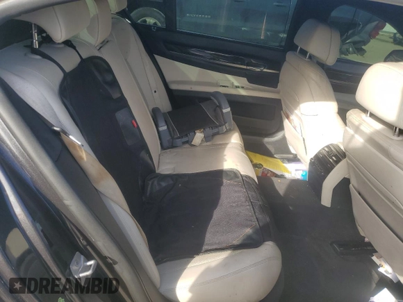 2015 BMW 7 Series 750Li with VIN WBAYE8C59FD780945, listed as a Copart auction lot 42730625 with 0 mi miles and Salvage Title. Bid and sale history available at carsss.com. Image 10.