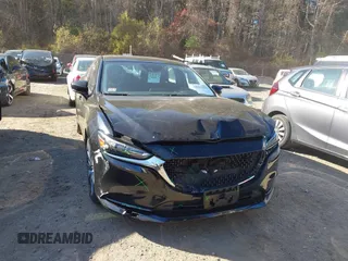 2018 Mazda 6 Grand Touring with VIN JM1GL1TY0J1319083, listed as a IAAI auction lot 40852818 with 57,408 mi miles and . Bid and sale history available at DreamBid. Image 12.