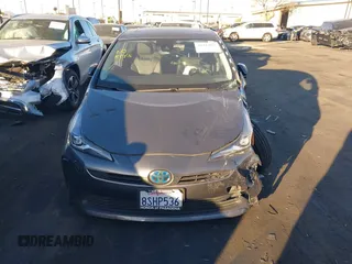 2020 Toyota Prius L Eco z VIN JTDKARFU9L3104882, wystawiony jako IAAI lot #41243035 z przebiegiem 29 013 mil mil oraz . Historia ofert i sprzedaży dostępna na DreamBid. Obrazek 13.