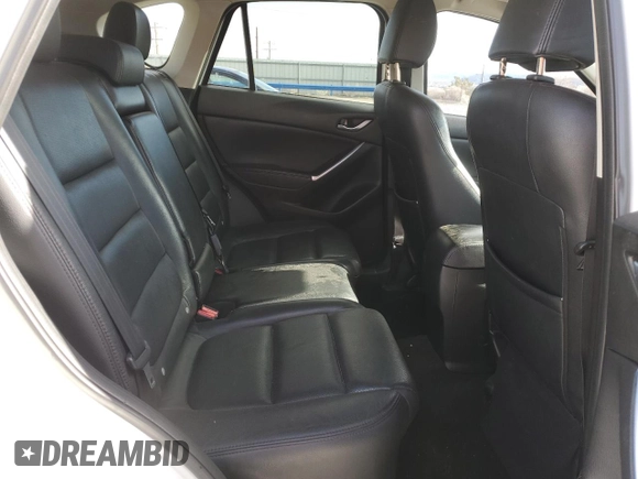2016 Mazda CX-5 Grand Touring with VIN JM3KE4DY3G0672069, listed as a Copart auction lot 49482575 with 172,129 mi miles and Salvage Title. Bid and sale history available at DreamBid. Image 12.