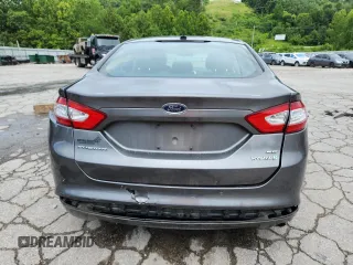 2013 Ford Fusion SE Hybrid with VIN 3FA6P0LU2DR329816, listed as a Copart auction lot 64308255 with 217,157 mi miles and Salvage title. Bid and sale history available at DreamBid. Image 6.