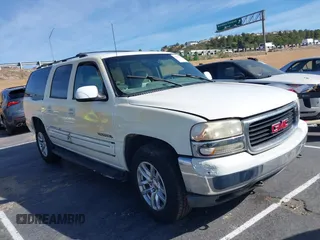 2001 GMC Yukon XL SLE with VIN 3GKFK16TX1G276201, listed as a IAAI auction lot 41537220 with 150,495 mi miles. Bid and sale history available at carsss.com. Image 1.