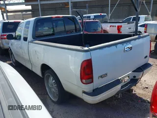 2001 Ford F-150 XL z VIN 1FTRX17L31NA79032, wystawiony jako IAAI lot #42334280 z przebiegiem Nie podano mil oraz . Historia ofert i sprzedaży dostępna na DreamBid. Obrazek 3.