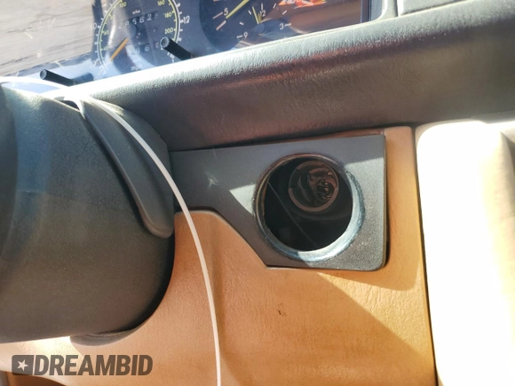 1987 Mercedes-Benz 300 с VIN WDBEB93D1HF041635, выставлен на аукционе Copart как лот 53718845 с пробегом 285 625 миль миль и Чистый • Clean title. История ставок и продаж доступна на DreamBid. Изображение 12.
