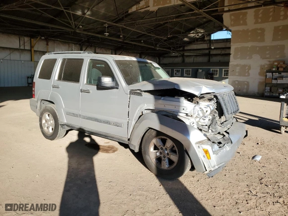 2009 Jeep Liberty Sport with VIN 1J8GN28K99W541035, listed as a Copart auction lot 36967944 with 123,741 mi miles and Salvage Title. Bid and sale history available at carsss.com. Image 4.