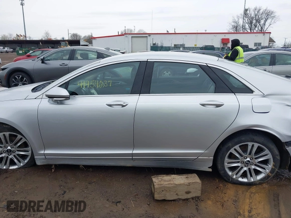 2013 Lincoln MKZ с VIN 3LN6L2GK0DR823324, выставлен на аукционе IAAI как лот 41954237 с пробегом 135 077 миль миль и . История ставок и продаж доступна на DreamBid. Изображение 14.