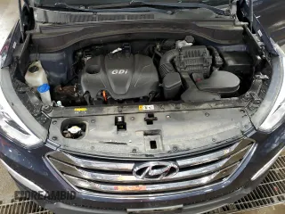 2014 Hyundai Santa Fe z VIN 5XYZUDLB0EG200376, wystawiony jako Copart lot #53634165 z przebiegiem 64 561 mil mil oraz Szkoda całkowita • Salvage title. Historia ofert i sprzedaży dostępna na DreamBid. Obrazek 12.