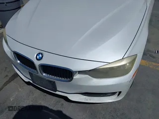 2013 BMW 3 Series 328i with VIN WBA3A5C51DF352812, listed as a IAAI auction lot 41974158 with 176,951 mi miles. Bid and sale history available at carsss.com. Image 6.