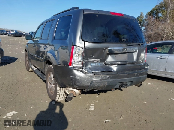 2011 Honda Pilot EX-L with VIN 5FNYF3H66BB018616, listed as a IAAI auction lot 41449001 with 221,499 mi miles and . Bid and sale history available at DreamBid. Image 3.