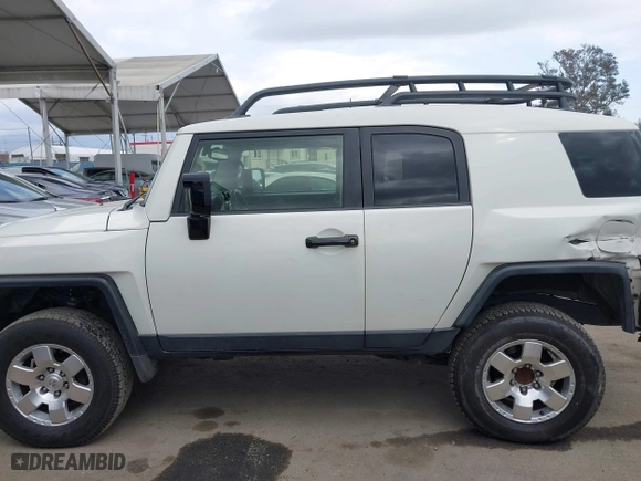 2014 Toyota FJ Cruiser with VIN JTEBU4BF7EK177741, listed as a IAAI auction lot 41871477 with 195,262 mi miles. Bid and sale history available at carsss.com. Image 15.