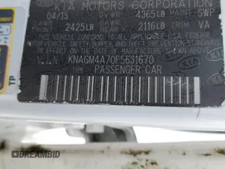 2015 Kia Optima LX z VIN KNAGM4A70F5631670, wystawiony jako Copart lot #60112385 z przebiegiem Nie podano mil oraz Nie do naprawy • Non repairable. Historia ofert i sprzedaży dostępna na DreamBid. Obrazek 12.