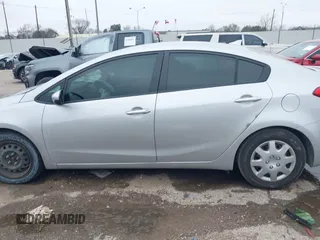 2016 Kia Forte LX with VIN KNAFK4A60G5446108, listed as a IAAI auction lot 41604040 with 57,754 mi miles. Bid and sale history available at carsss.com. Image 14.