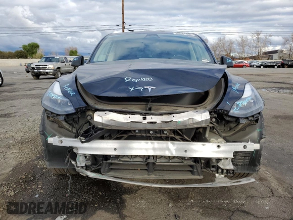 2023 Tesla Model Y Long Range with VIN 7SAYGDEE8PF877926, listed as a Copart auction lot 44342645 with 41,408 mi miles and Salvage Title. Bid and sale history available at DreamBid. Image 5.