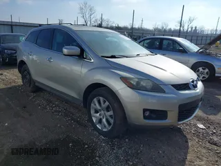 2007 Mazda CX-7 Grand Touring with VIN JM3ER293870138360, listed as a IAAI auction lot 41243064 with 142,889 mi miles. Bid and sale history available at carsss.com. Image 1.