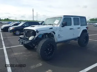 2020 Jeep Wrangler Unlimited Sport S with VIN 1C4HJXDN6LW198065, listed as a IAAI auction lot 42049279 with 72,512 mi miles. Bid and sale history available at carsss.com. Image 2.