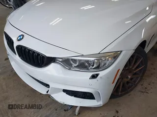 2015 BMW 4 Series 435i xDrive z VIN WBA4B3C53FD669771, wystawiony jako IAAI lot #41835401 z przebiegiem 145 570 mil mil oraz . Historia ofert i sprzedaży dostępna na DreamBid. Obrazek 6.