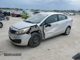 2014 Kia Rio LX with VIN KNADM4A34E6414129, listed as a Copart auction lot 57200814 with 101,090 mi miles and Salvage Title. Bid and sale history available at carsss.com. Image 1.