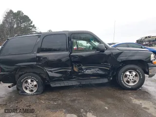 2003 Chevrolet Tahoe LS with VIN 1GNEC13Z73R243308, listed as a IAAI auction lot 41510266 with 246,378 mi miles. Bid and sale history available at carsss.com. Image 6.