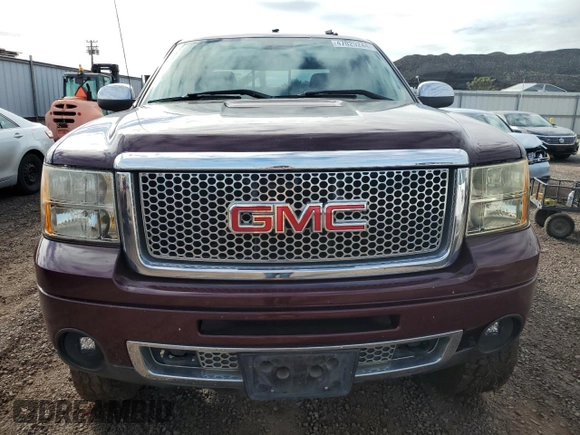 2008 GMC Sierra Denali z VIN 2GTEK638381238266, wystawiony jako Copart lot #47029244 z przebiegiem 119 433 mil mil oraz Nie do naprawy. Historia ofert i sprzedaży dostępna na DreamBid. Obrazek 5.
