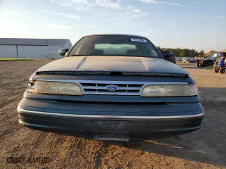 1996 Ford Crown Victoria LX with VIN 2FALP74W5TX146843, listed as a Copart auction lot 77251964 with 74,559 mi miles and Clean Title. Bid and sale history available at carsss.com. Image 5.