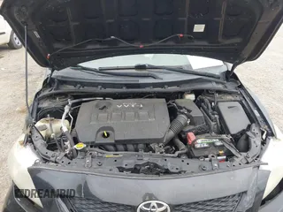 2009 Toyota Corolla with VIN 1NXBU40E69Z027673, listed as a IAAI auction lot 41882106 with 168,313 mi miles. Bid and sale history available at carsss.com. Image 10.
